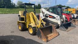 SWINGER 100 ARTICULATED WHEEL LOADER