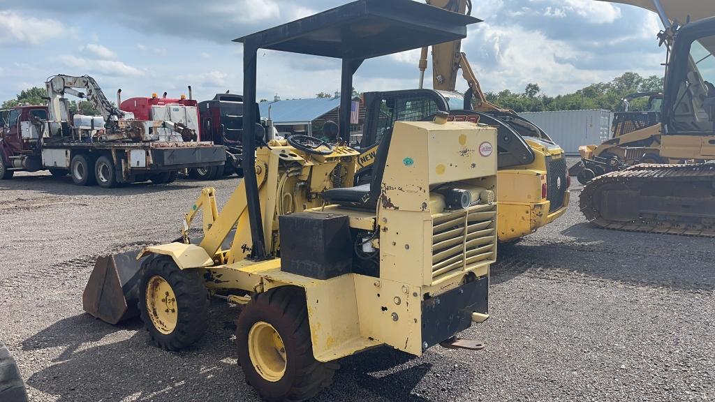 SWINGER 100 ARTICULATED WHEEL LOADER