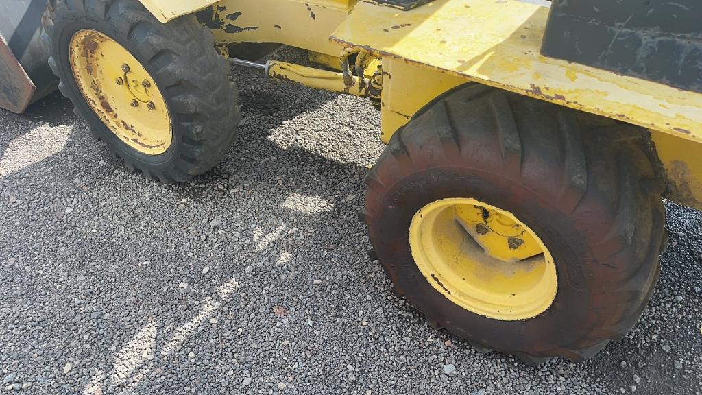 SWINGER 100 ARTICULATED WHEEL LOADER