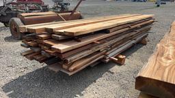 STACK OF ROUGH CUT LUMBER