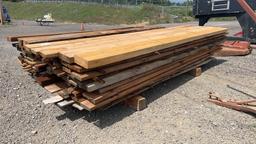 STACK OF ROUGH CUT LUMBER