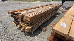 STACK OF ROUGH CUT LUMBER