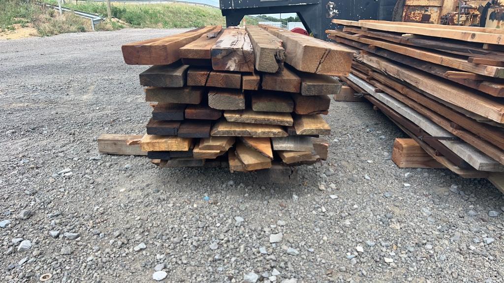 STACK OF ROUGH CUT LUMBER