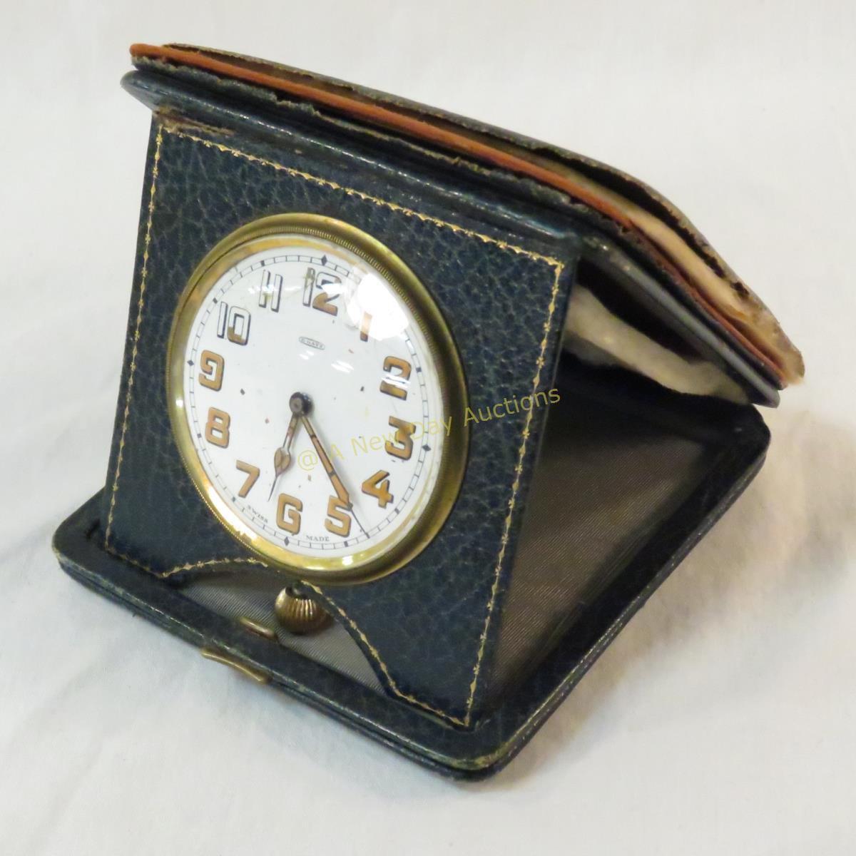 Vintage travel clock with leather case