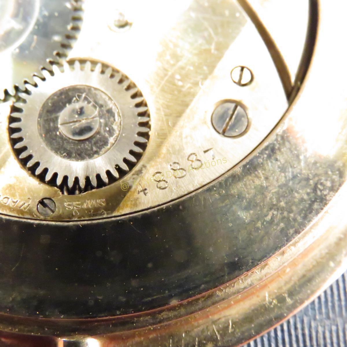 Vintage travel clock with leather case