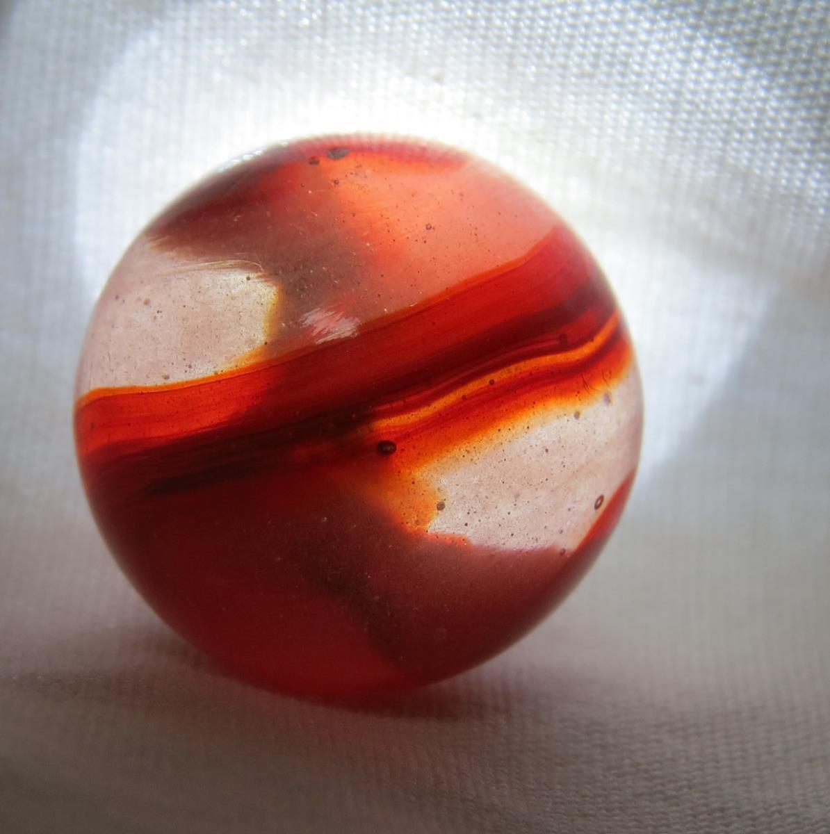 Akro Agate Cherry hurricane Oxblood marble