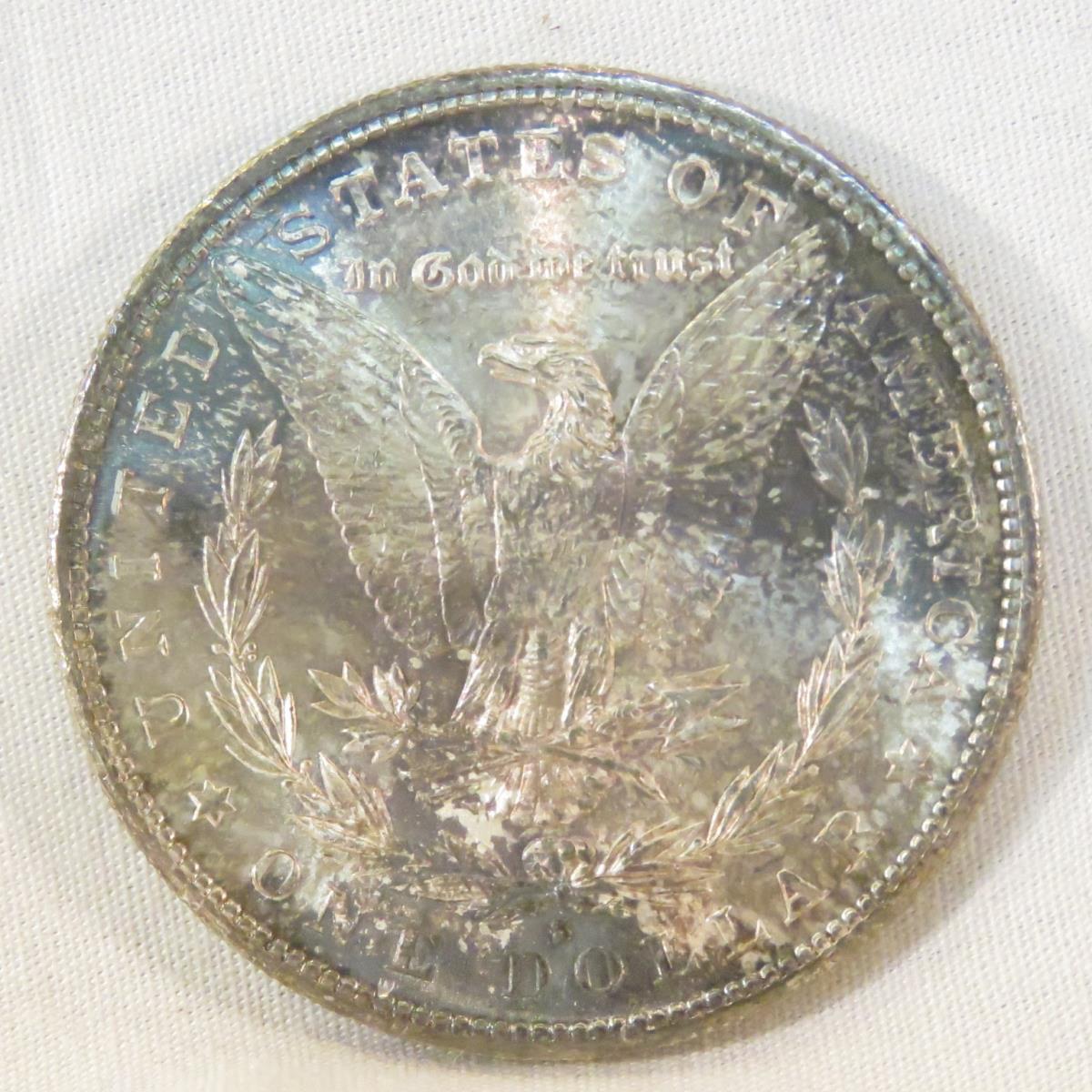 23 Morgan Silver Dollars 1878-1921 in book