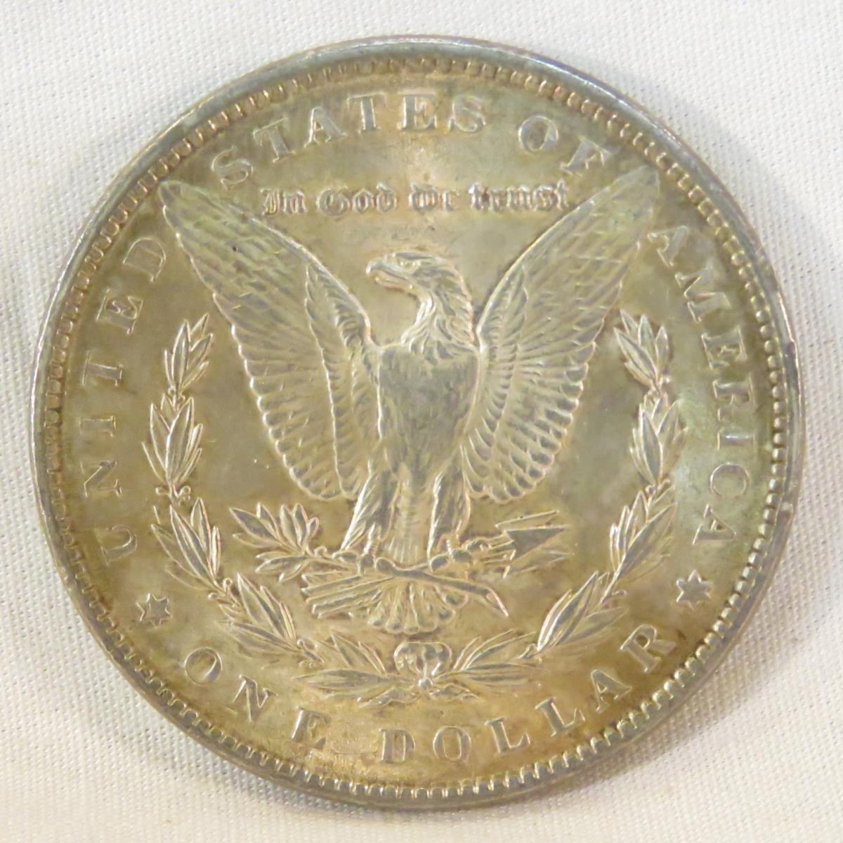 23 Morgan Silver Dollars 1878-1921 in book
