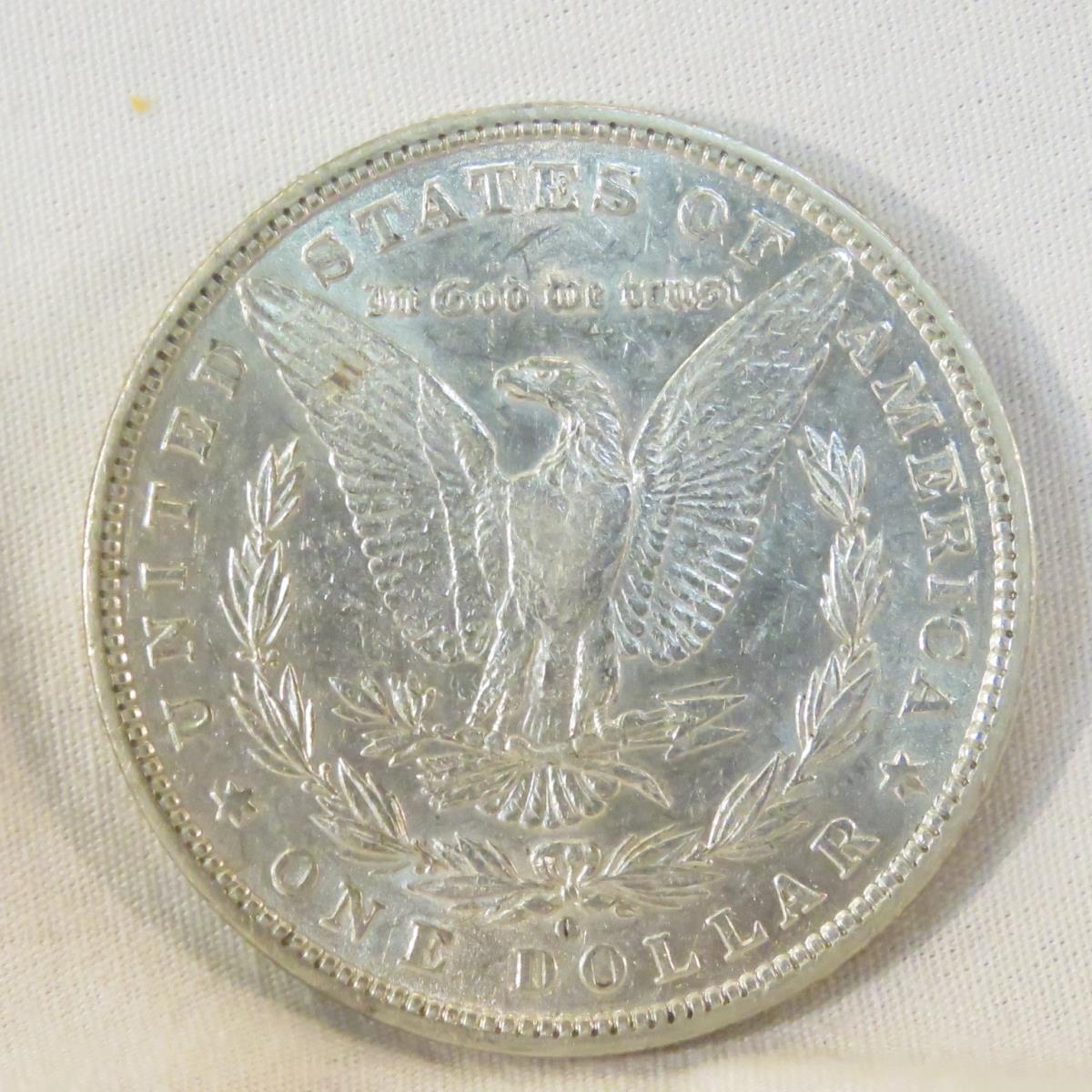 23 Morgan Silver Dollars 1878-1921 in book