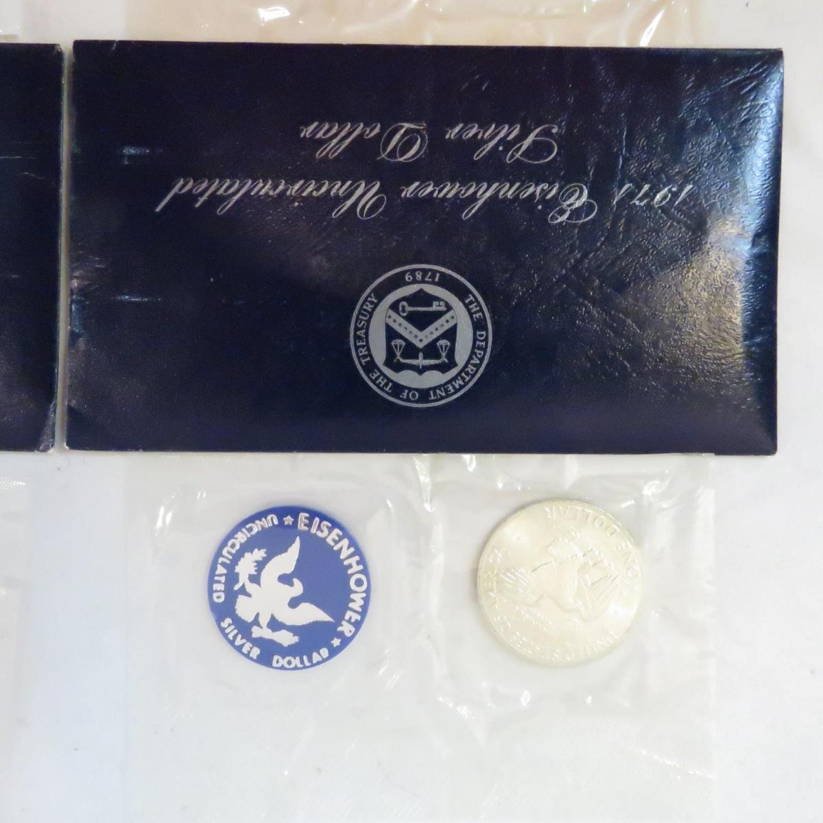 3 1971 UNC Eisenhower dollars & 1976 silver set