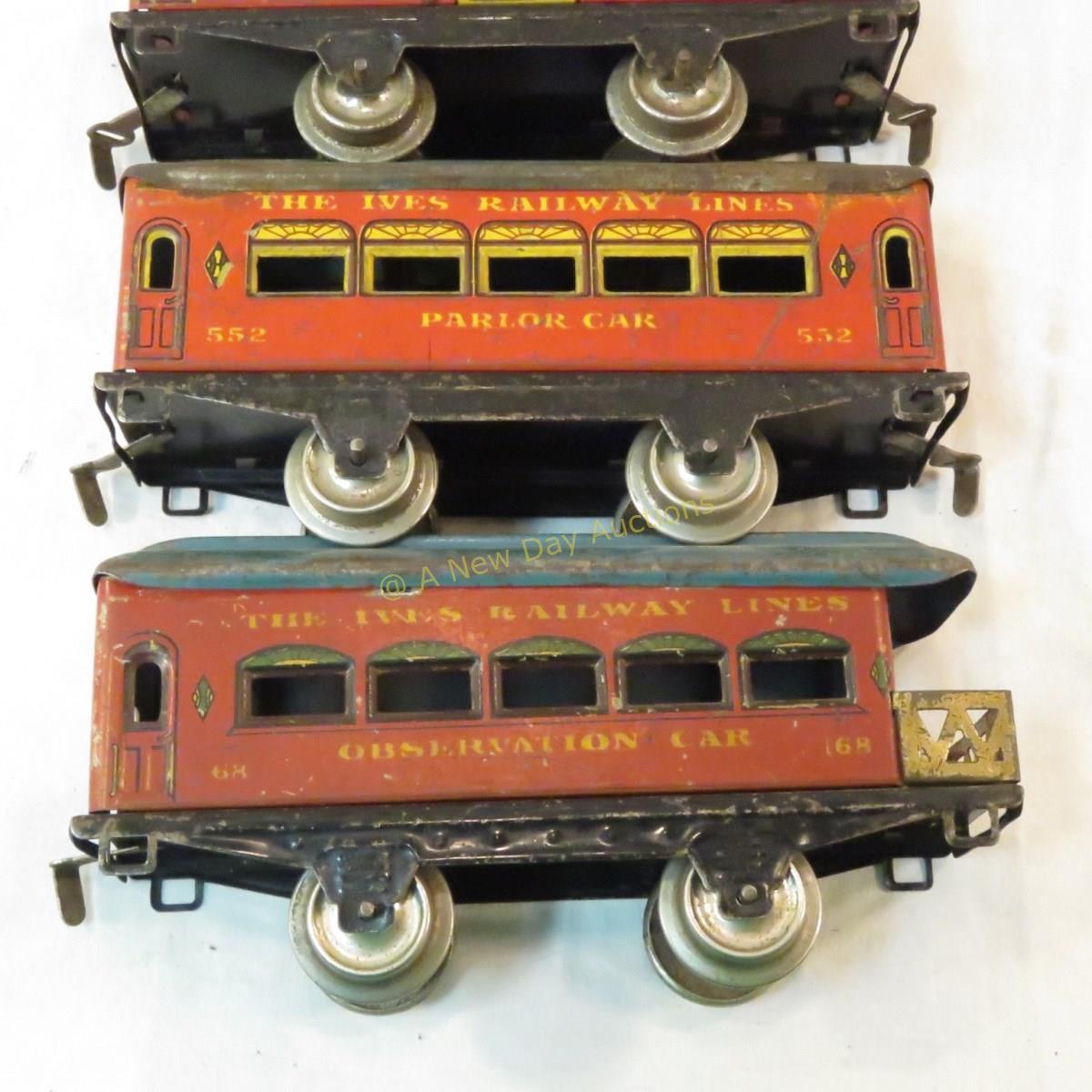 Pre-war Ives cast iron windup engine & 3 tin cars