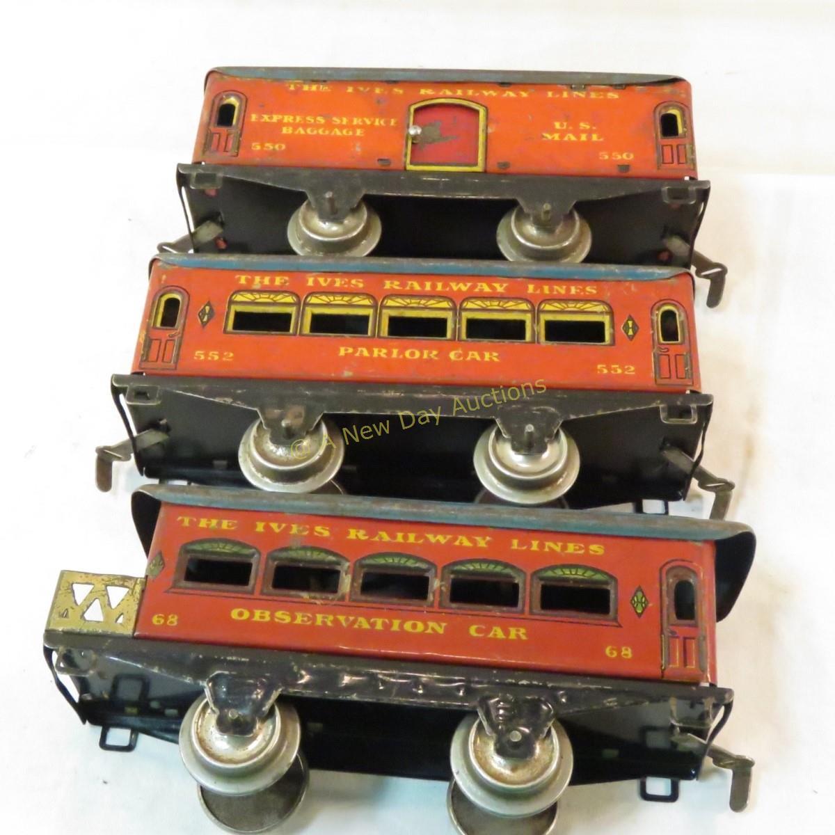 Pre-war Ives cast iron windup engine & 3 tin cars