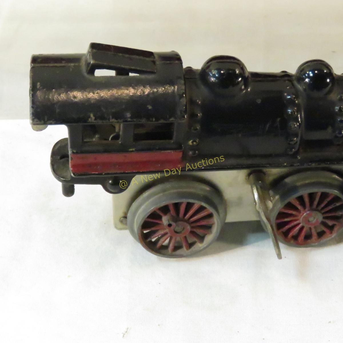 Pre-war Ives cast iron windup engine & 3 tin cars