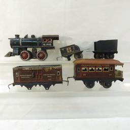 Pre-war Bing cast iron engine, tin tenders & cars