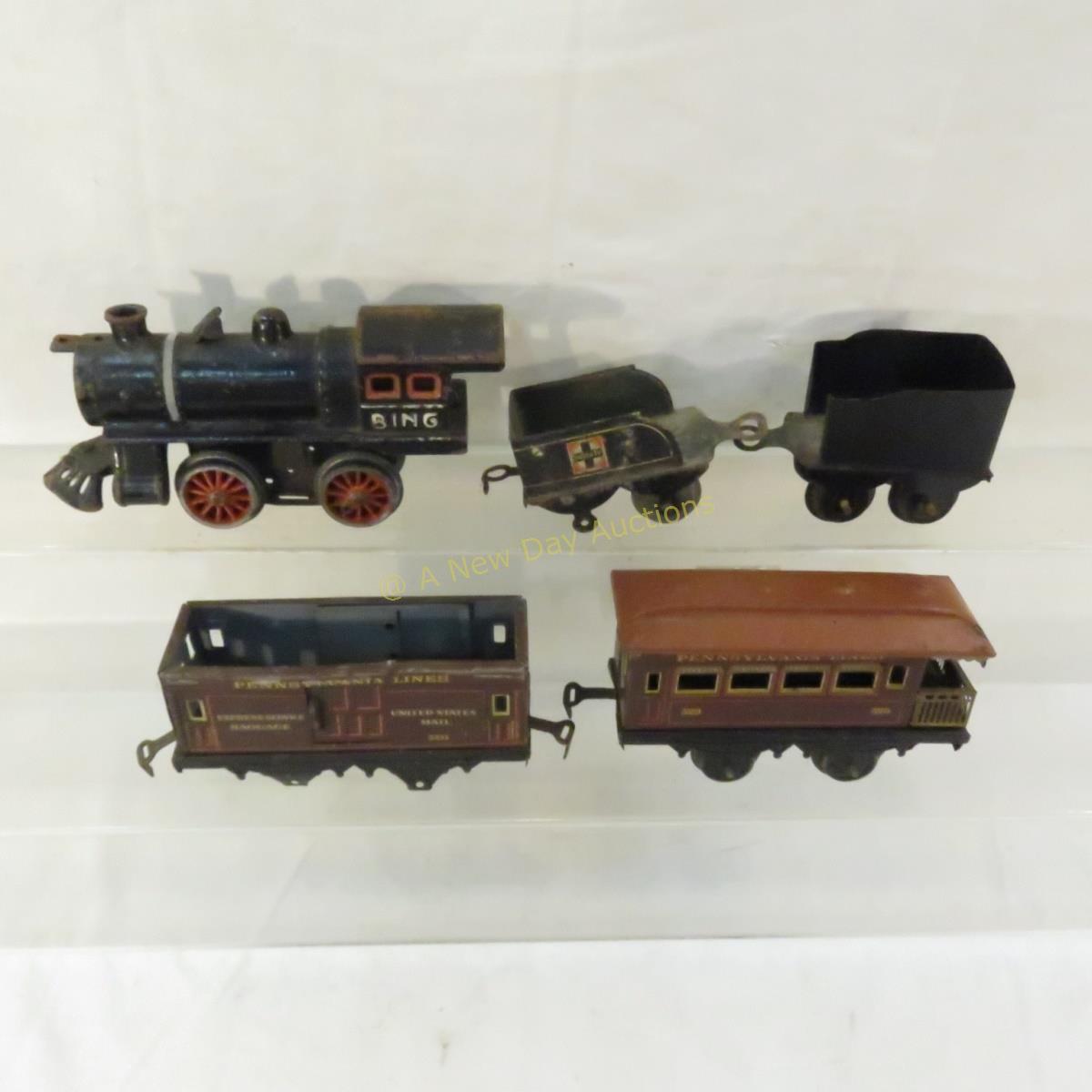 Pre-war Bing cast iron engine, tin tenders & cars