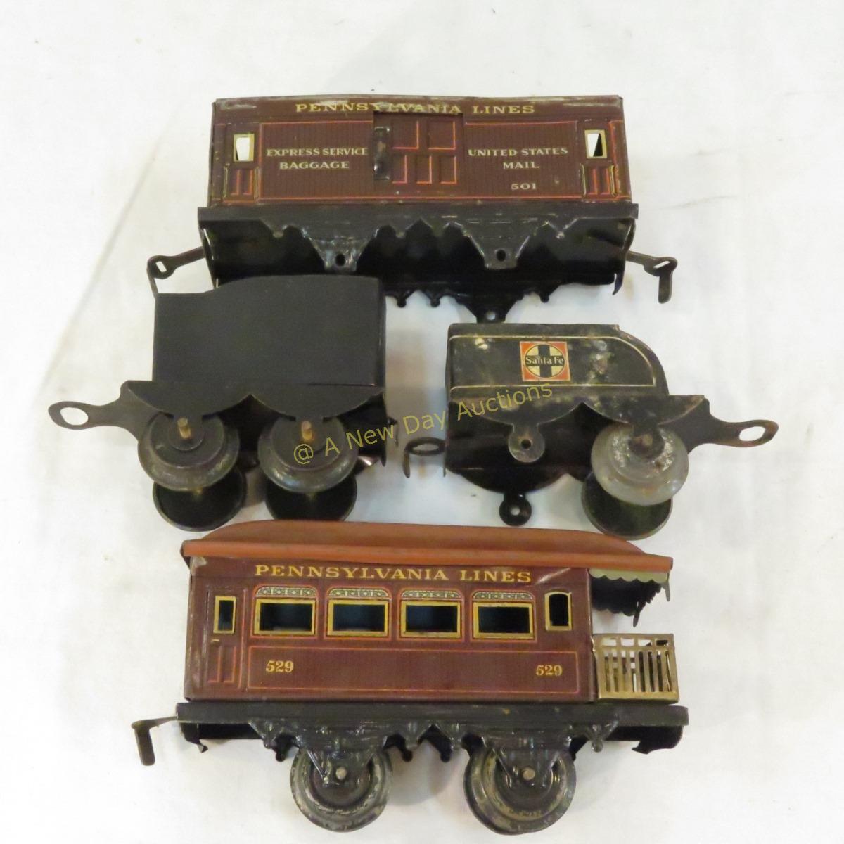 Pre-war Bing cast iron engine, tin tenders & cars