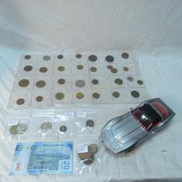 Foreign coins and 1 die cast corvette