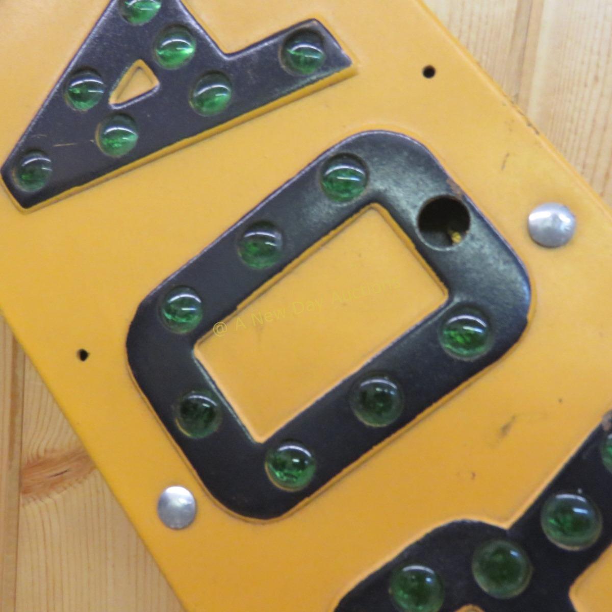 Yellow "RAILROAD CROSSING" Sign With Green Marbles