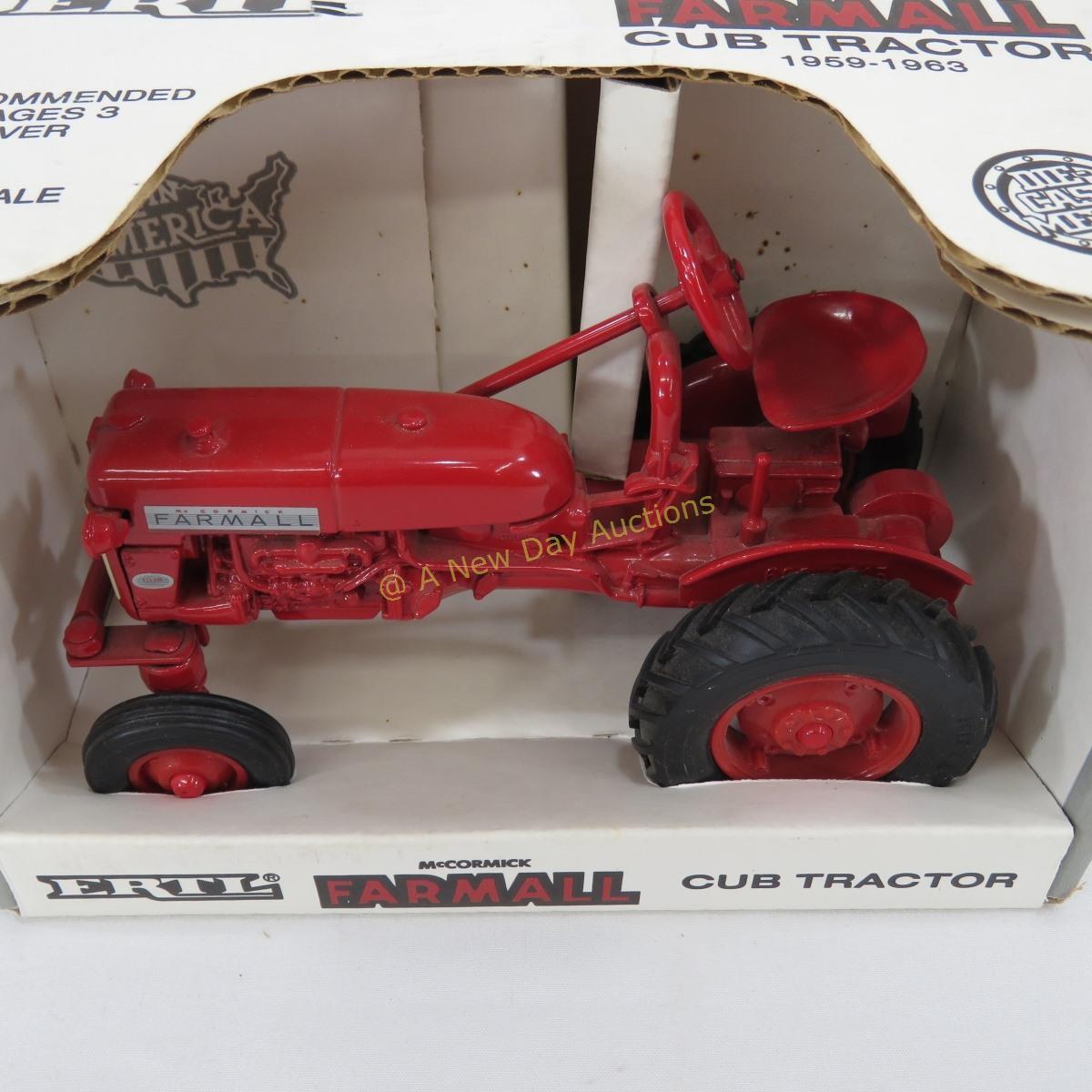 3 Ertl Farmall 1/16 scale tractors in boxes