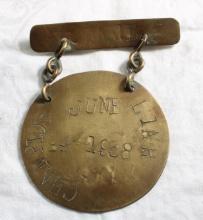 1938 Brass Champion Liar Award Badge