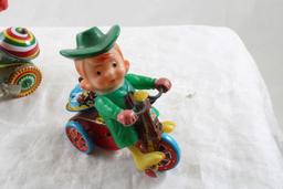 2 Wind Up Tin Toys Marx Cowgirl on Trike & Boy