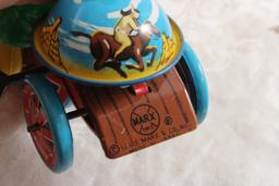 2 Wind Up Tin Toys Marx Cowgirl on Trike & Boy