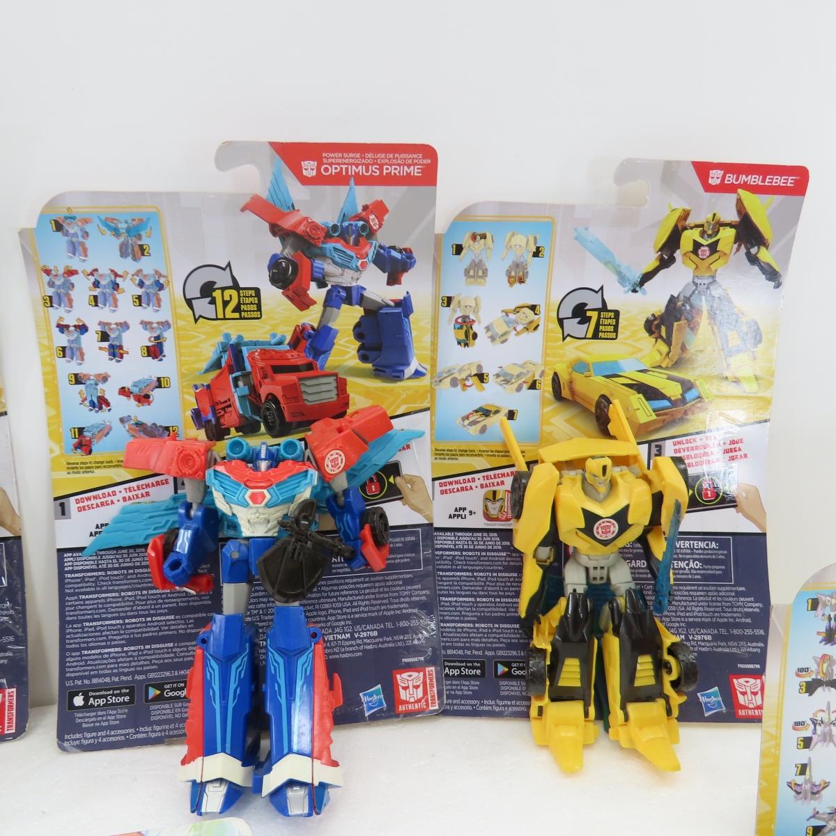 9 Transformers toys, some with Cards