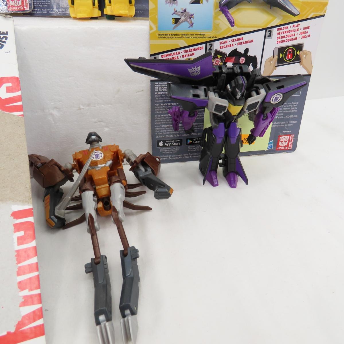 9 Transformers toys, some with Cards