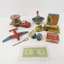 Vintage tin toys, 1st aid tins and play money