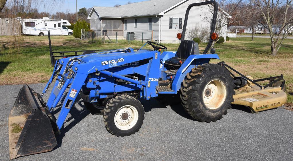 Lot # 5 - New Holland TC30 (Made from 2001-08)  garden tractor w/ 7308 front end loader, garage kept