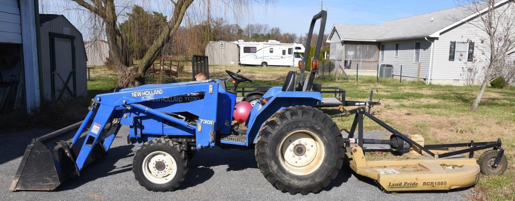 Lot # 5 - New Holland TC30 (Made from 2001-08)  garden tractor w/ 7308 front end loader, garage kept