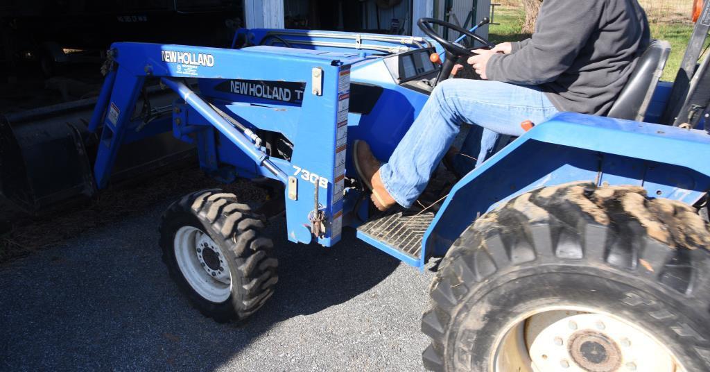 Lot # 5 - New Holland TC30 (Made from 2001-08)  garden tractor w/ 7308 front end loader, garage kept