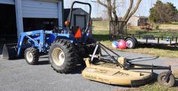 Lot # 5 - New Holland TC30 (Made from 2001-08)  garden tractor w/ 7308 front end loader, garage kept