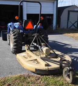 Lot # 5 - New Holland TC30 (Made from 2001-08)  garden tractor w/ 7308 front end loader, garage kept