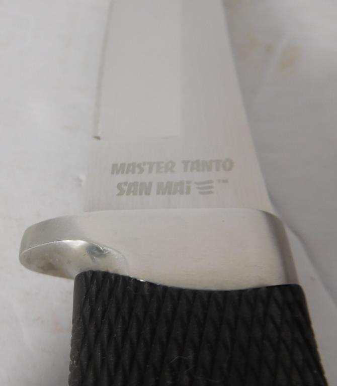 Lot #105E - Cold Steel Master Tonto San Mai knife in black leather sheath