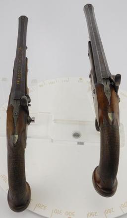 Lot #556 - Pair Canon & Foron Percussion Pistols