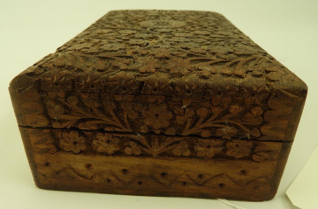 Lot 1710 - Carved jewelry box with elaborate floral carving