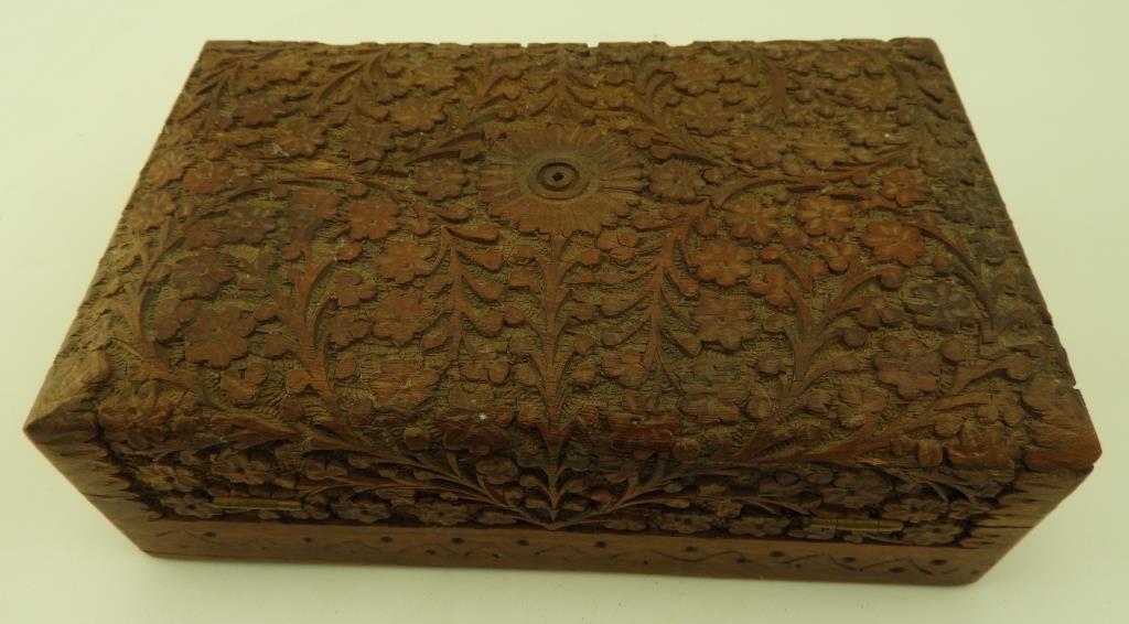 Lot 1710 - Carved jewelry box with elaborate floral carving