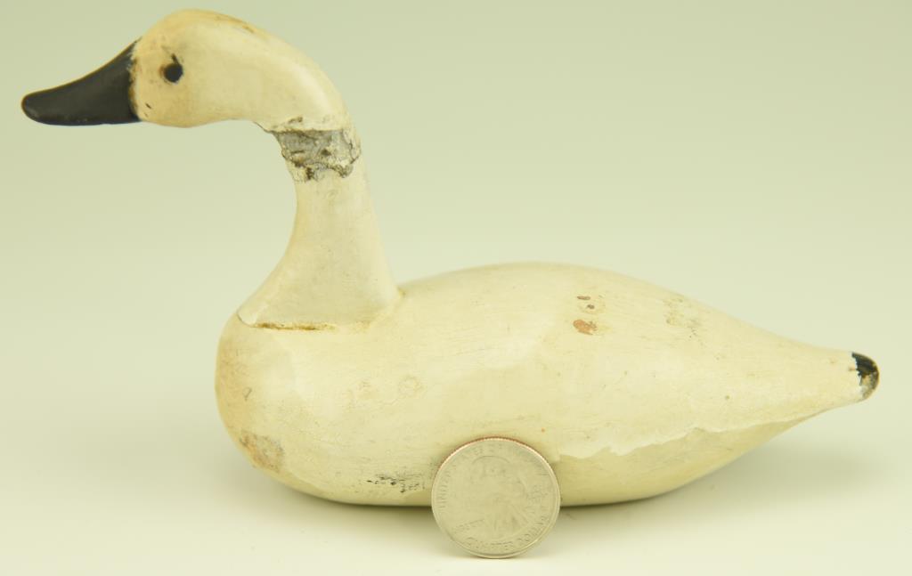 Lot #15 - Miniature carved Swan decoy by the Holly Family Havre de Grace, MD  (old repair to