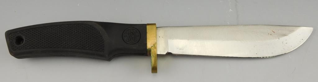 Lot #20 - Buck Model 119 Knife in sheath (10”), Smith & Wesson  9 ¼” in sheath, Crock Stick
