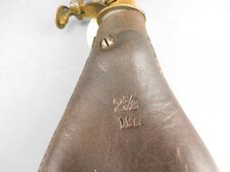 Lot #252 - (1) Vintage Powder Flask with stag motif and (1) leather 2 1/2lb shot pouch