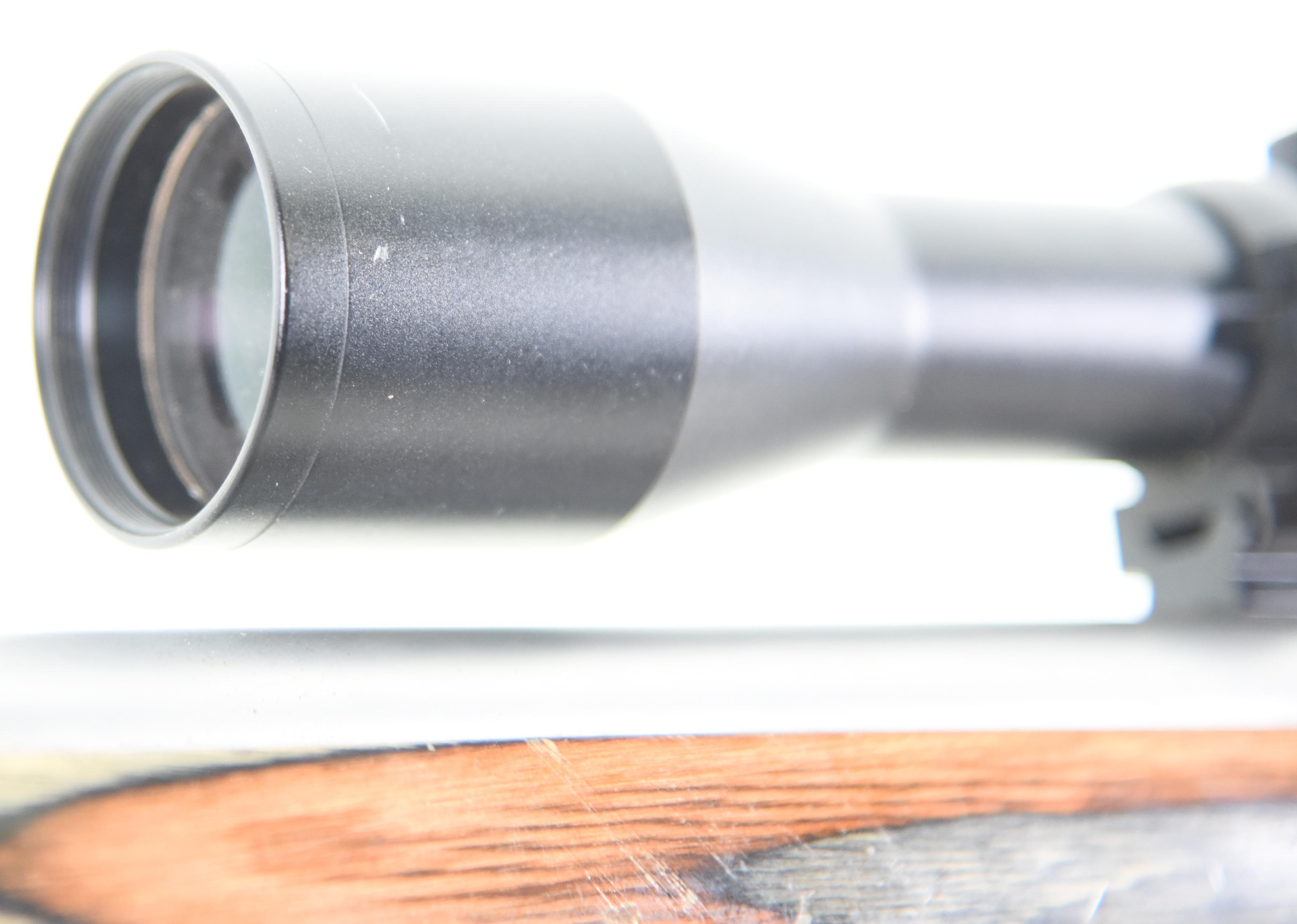 Knight Disc Extreme .45 Cal Blackpowder Rifle W/Thumbhole Laminate Stock & Stainless Fluted BBL