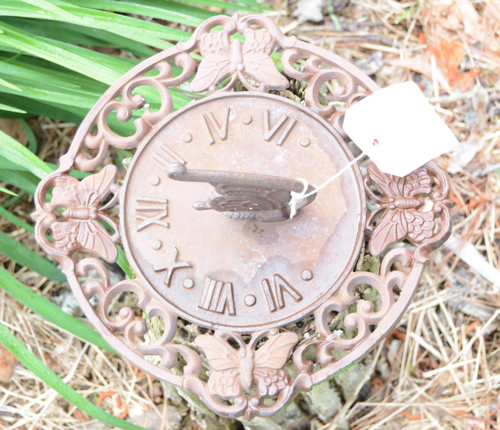 Lot #1 -  Cast iron butterfly decorated sun dial 12” diameter