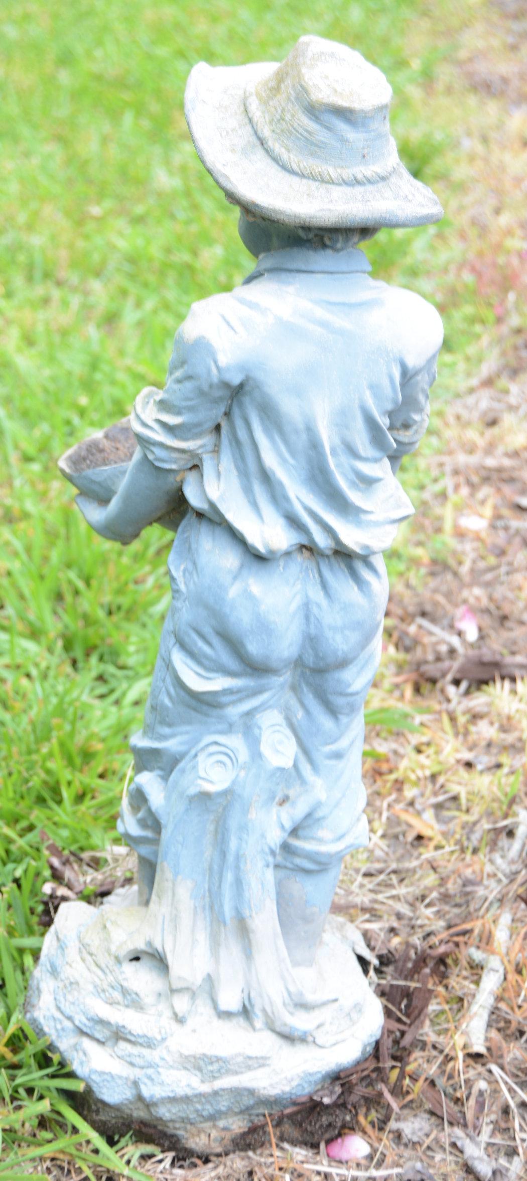 Lot #10 - Pair of Resin boy and girl garden statuaries 16” each