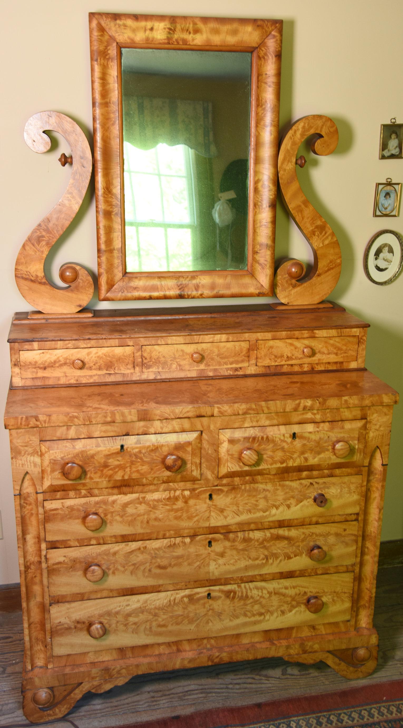 Lot #533 - Stunning late 19th Century classic revival Maple flame veneered dresser with antlered