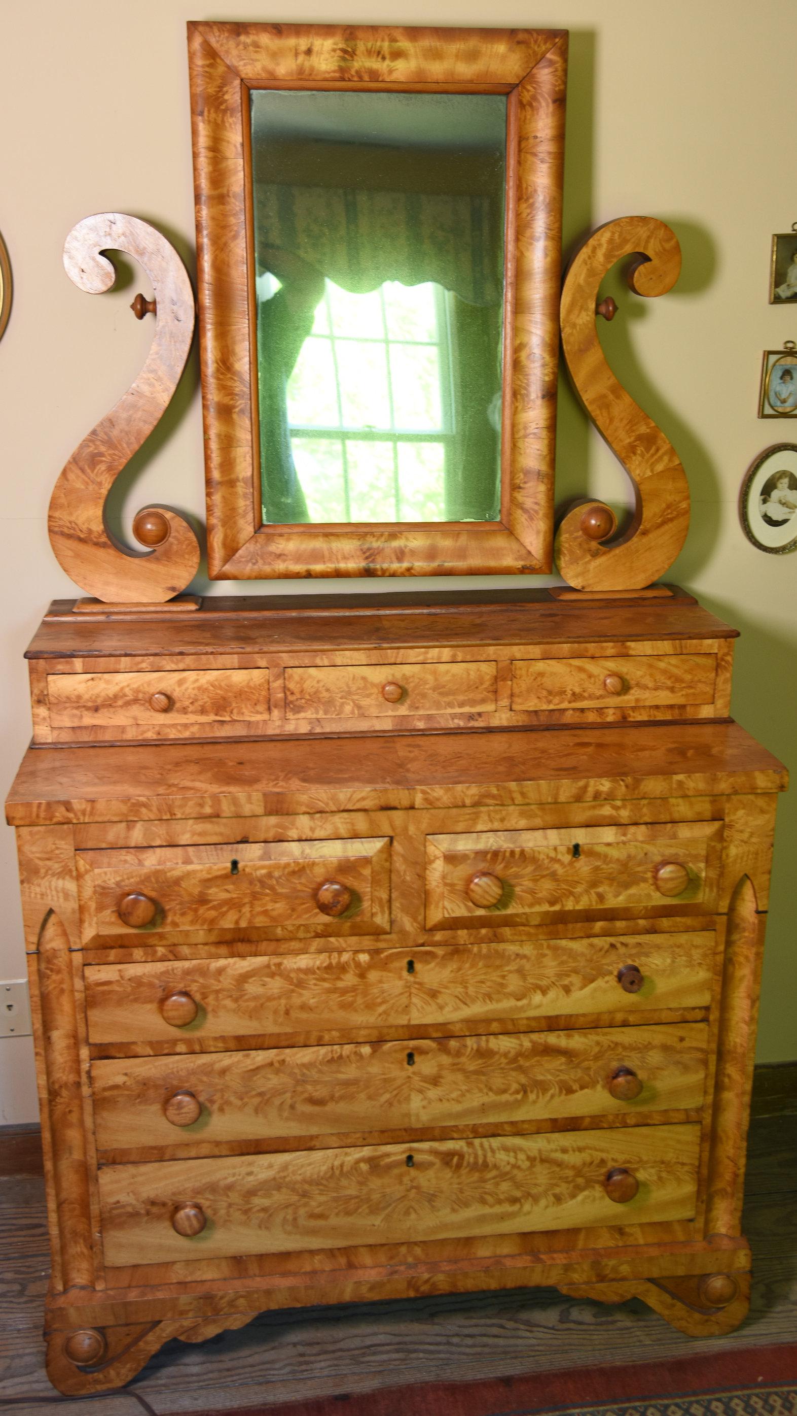 Lot #533 - Stunning late 19th Century classic revival Maple flame veneered dresser with antlered