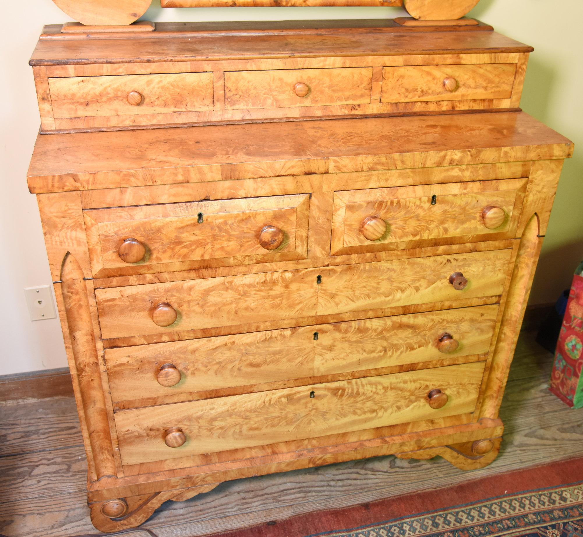 Lot #533 - Stunning late 19th Century classic revival Maple flame veneered dresser with antlered