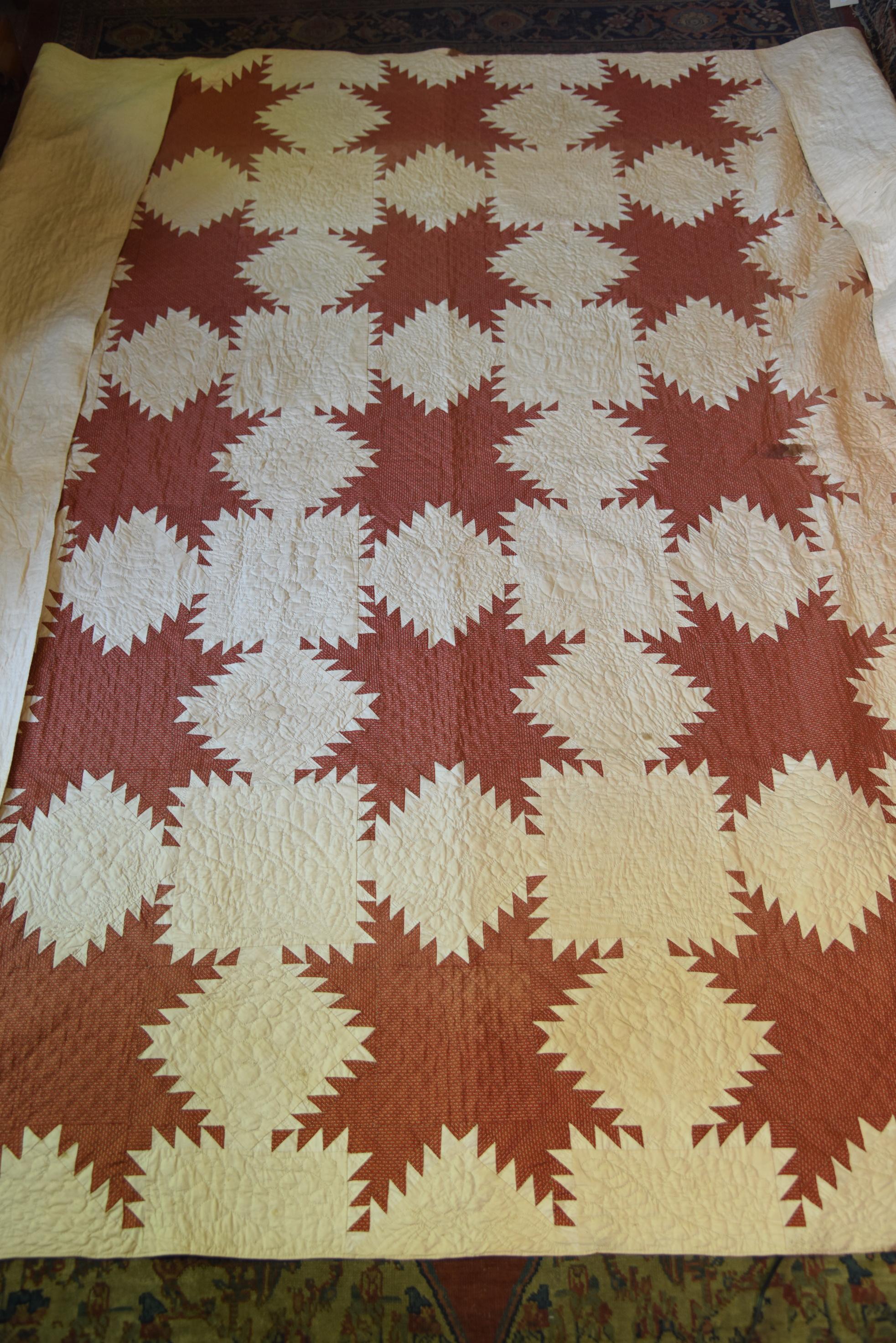 Lot #539 - Red and Ivory pattern antique handsewn quilt (94” x 96”)