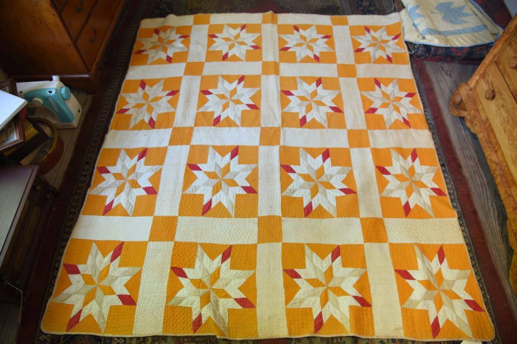 Lot #544 - American  hand sewn Blazing starburst pattern antique quilt in sixteen 13” x 15”