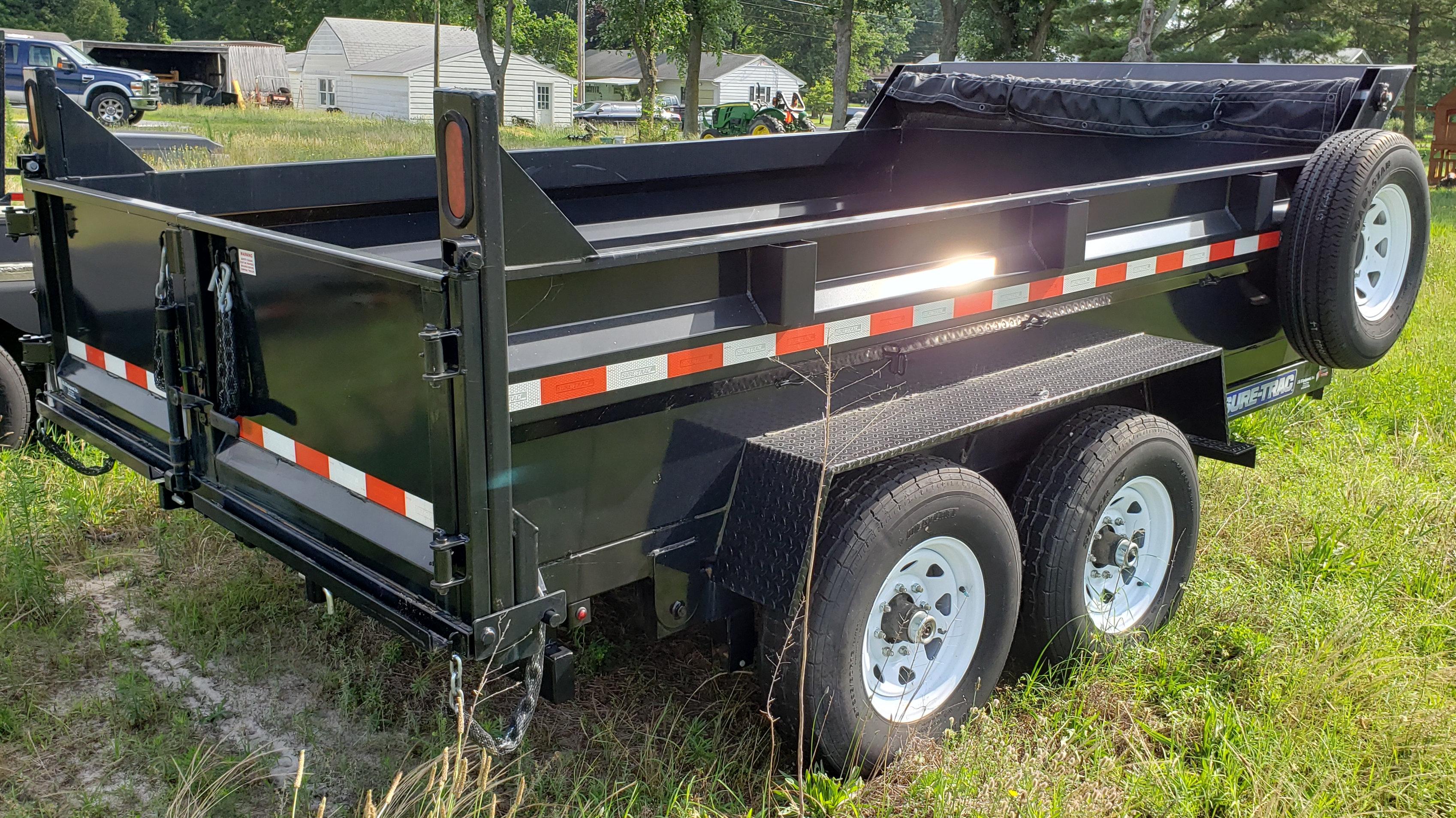 Lot #13-2016 Novae Co Sure Trac Mdl ST8212DD-B-120 (12' Long x 6'9" Wide) Dual Axle Dump Trailer